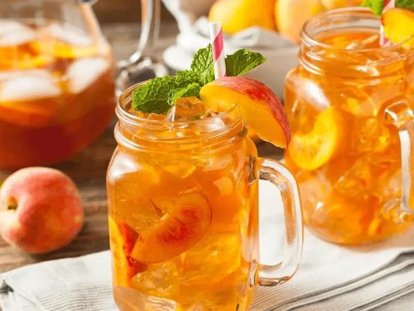 طرز تهیه آیس تی هلو به 2 روش ساده و نعنایی طرز تهیه آیس تی هلو به 2 روش ساده و نعنایی